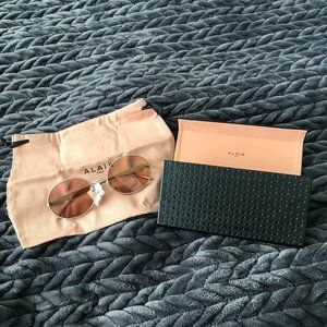 Alaia 60mm Round Sunglasses